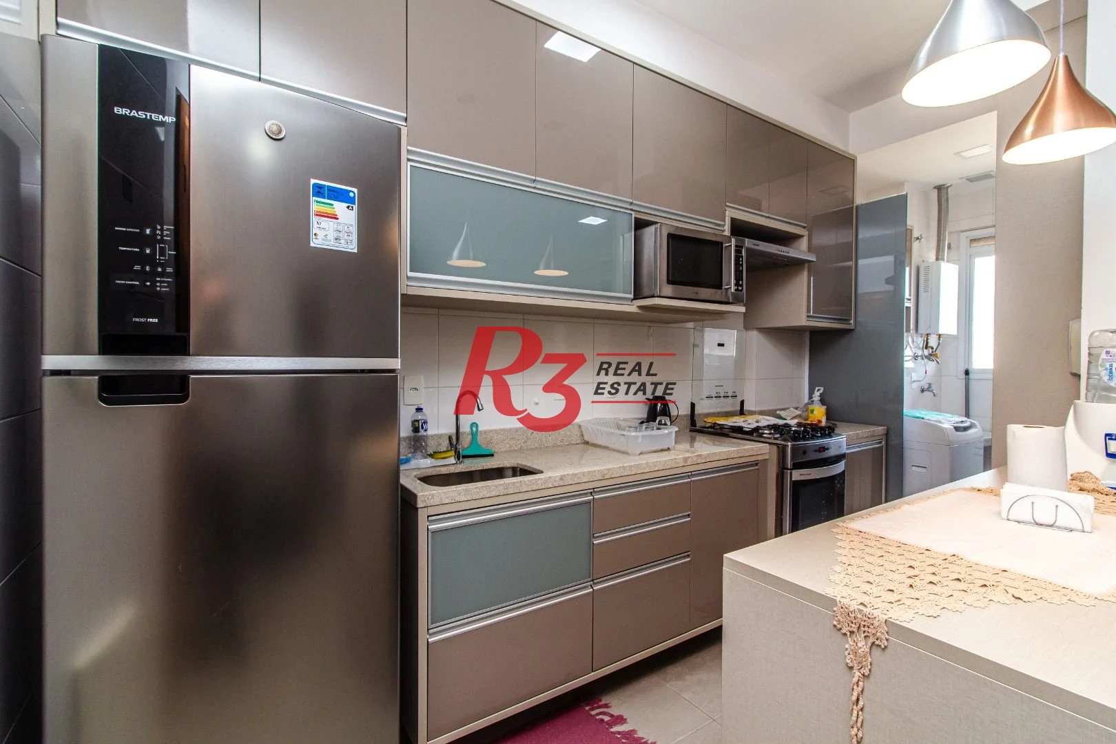 Apartamento com 2 dormitórios à venda, 73 m² por R$ 1.380.000,00 - Gonzaga - Santos/SP