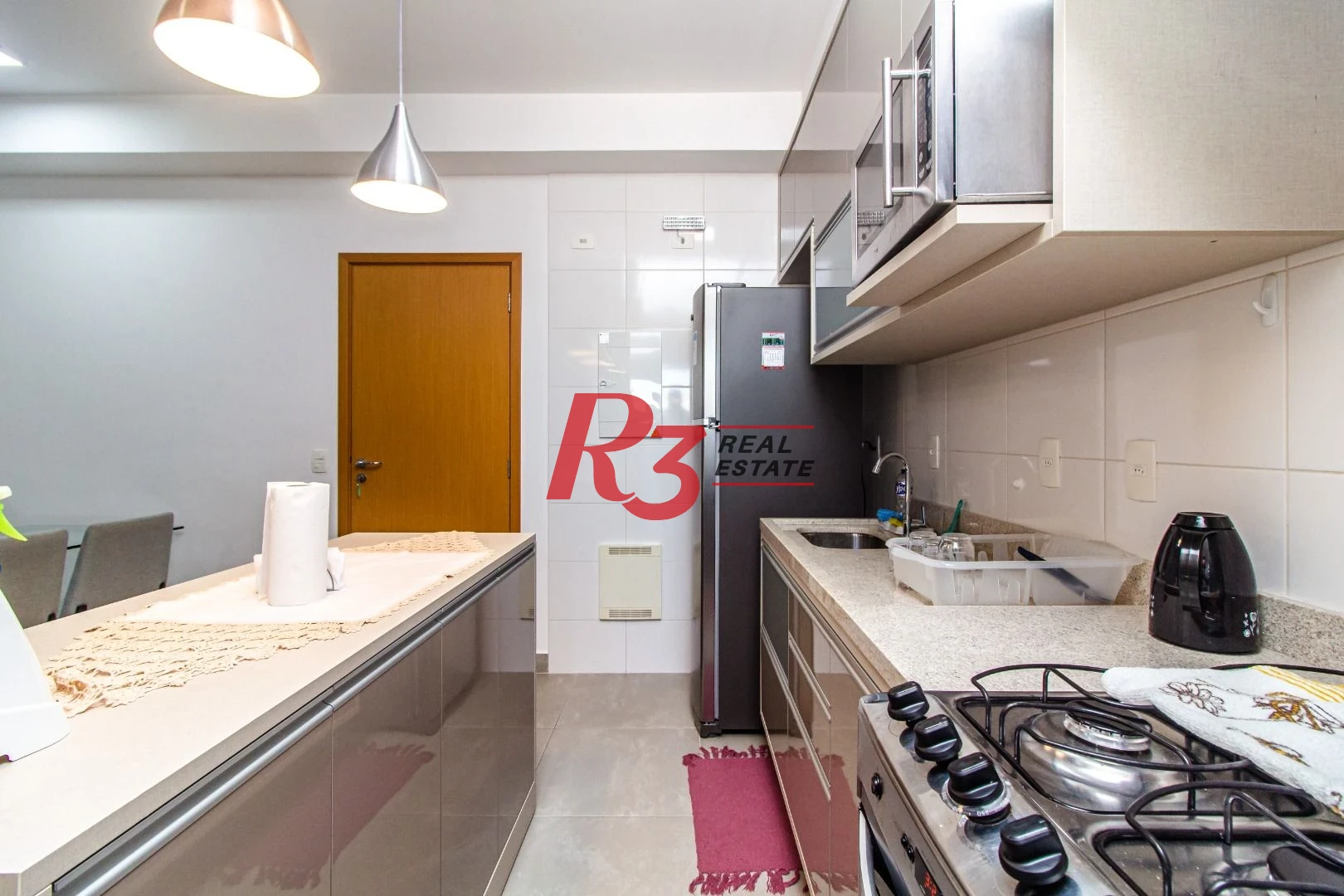 Apartamento com 2 dormitórios à venda, 73 m² por R$ 1.380.000,00 - Gonzaga - Santos/SP