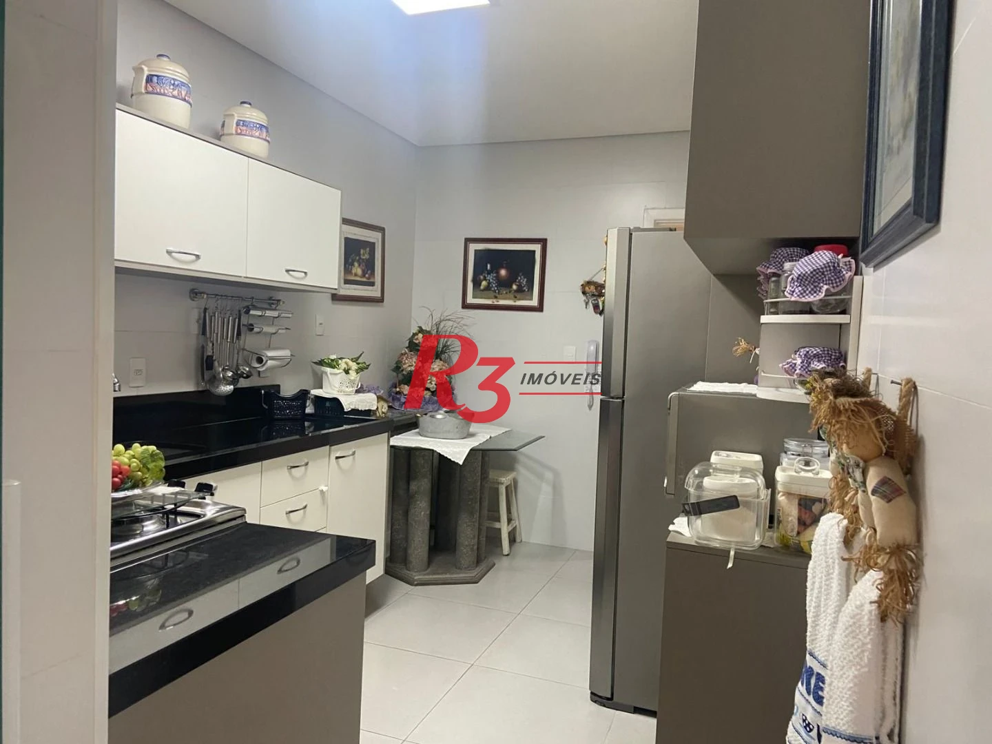 Apartamento com 2 dormitórios à venda, 90 m² por R$ 780.000,00 - Gonzaga - Santos/SP