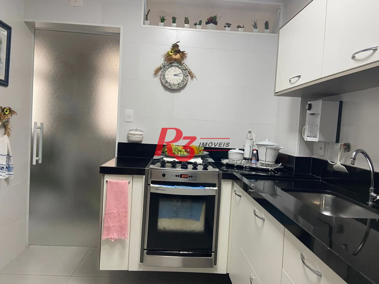 Apartamento com 2 dormitórios à venda, 90 m² por R$ 780.000,00 - Gonzaga - Santos/SP