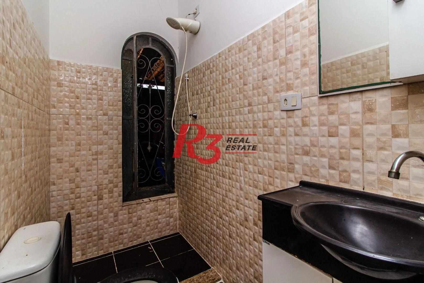 Casa com 3 dormitórios à venda, 375 m² por R$ 1.700.000,00 - Macuco - Santos/SP