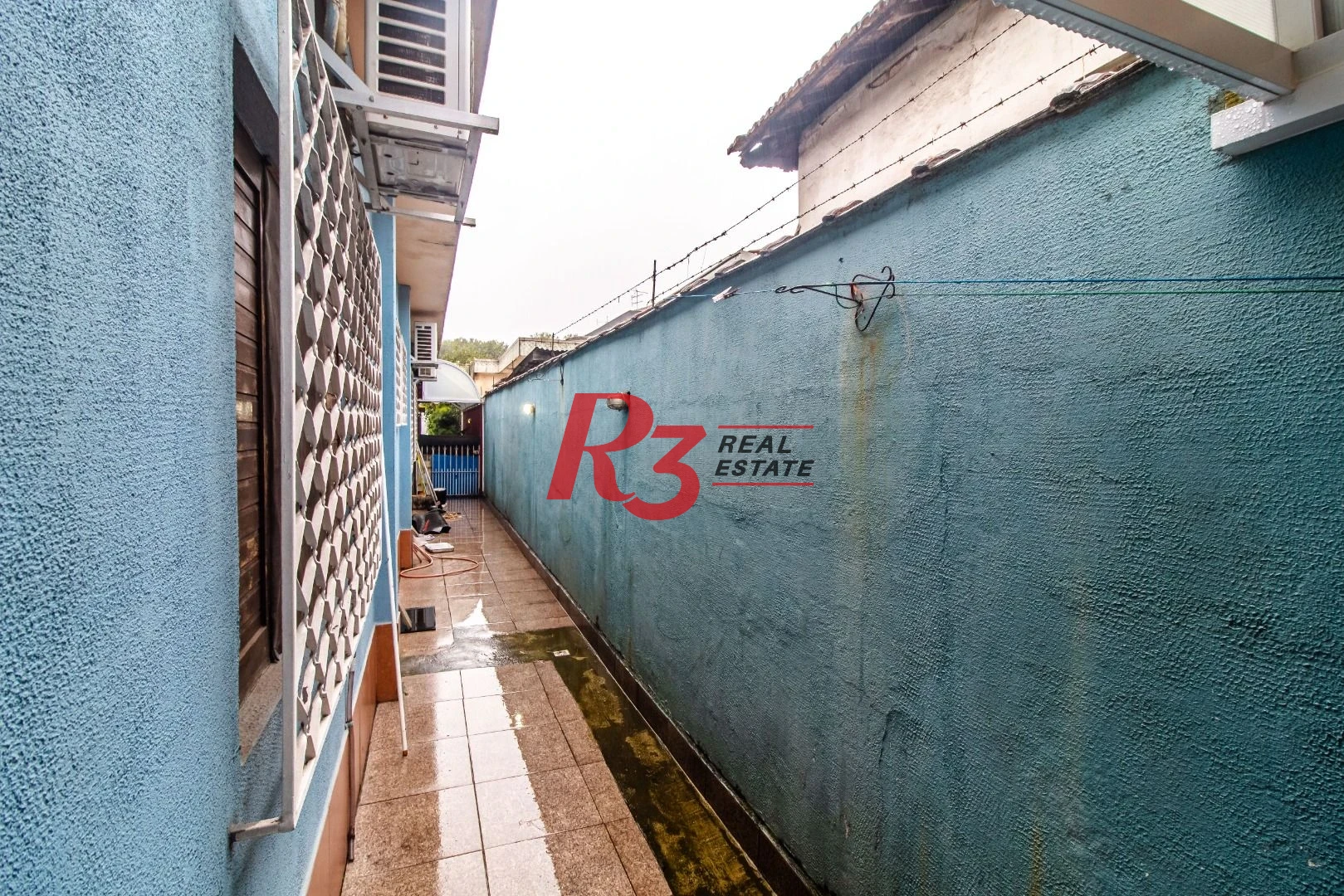 Casa com 3 dormitórios à venda, 375 m² por R$ 1.700.000,00 - Macuco - Santos/SP