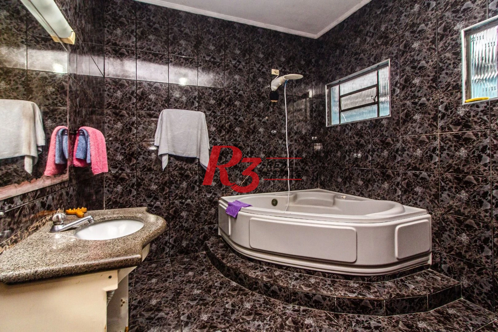 Casa com 3 dormitórios à venda, 375 m² por R$ 1.700.000,00 - Macuco - Santos/SP