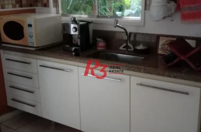 Sobrado com 3 dormitórios à venda, 100 m² por R$ 660.000,00 - Encruzilhada - Santos/SP