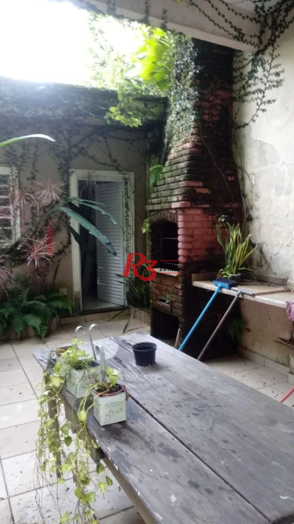 Sobrado com 3 dormitórios à venda, 100 m² por R$ 660.000,00 - Encruzilhada - Santos/SP
