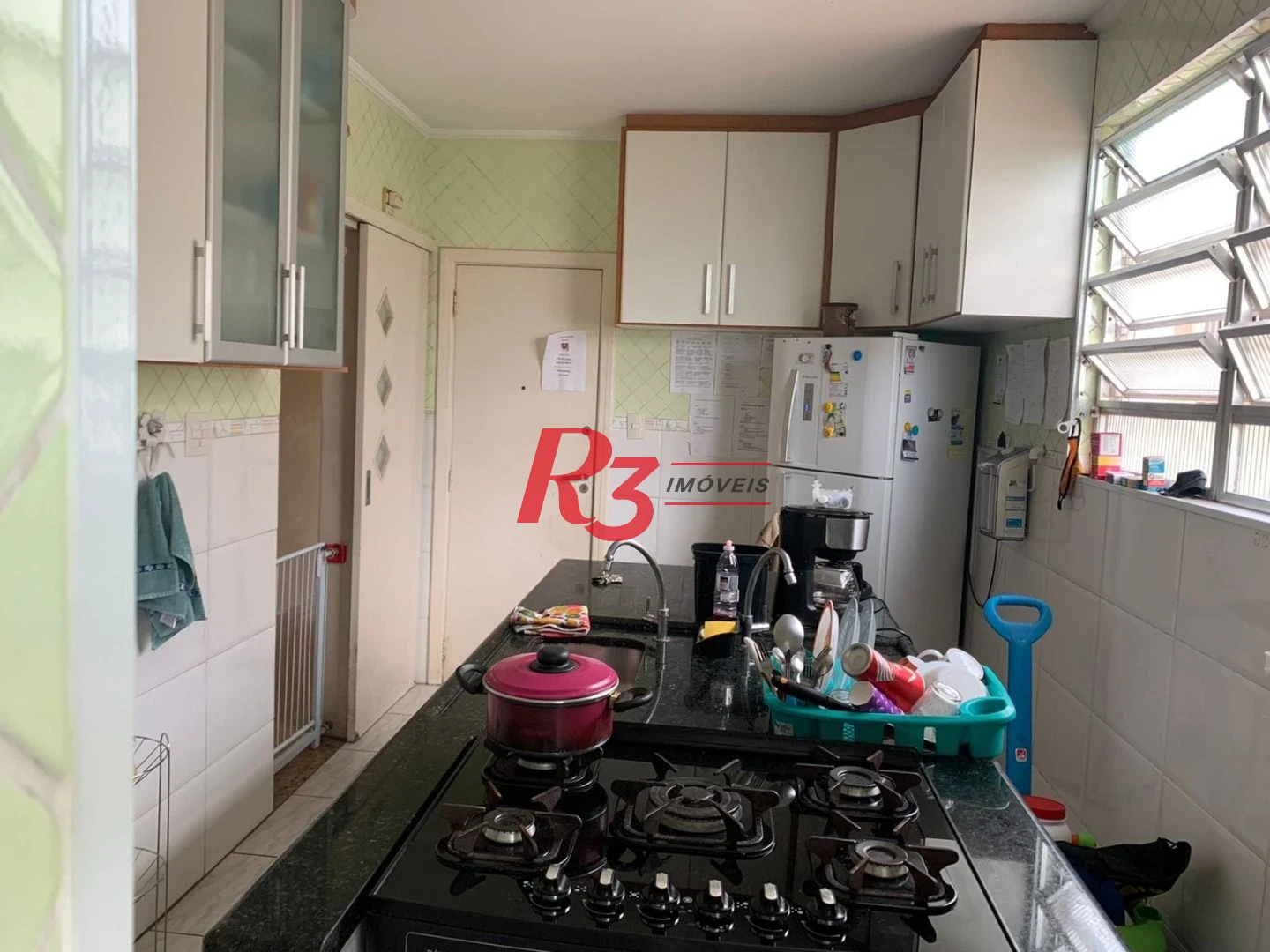 Apartamento com 3 dormitórios à venda, 100 m² por R$ 450.000,00 - Gonzaga - Santos/SP