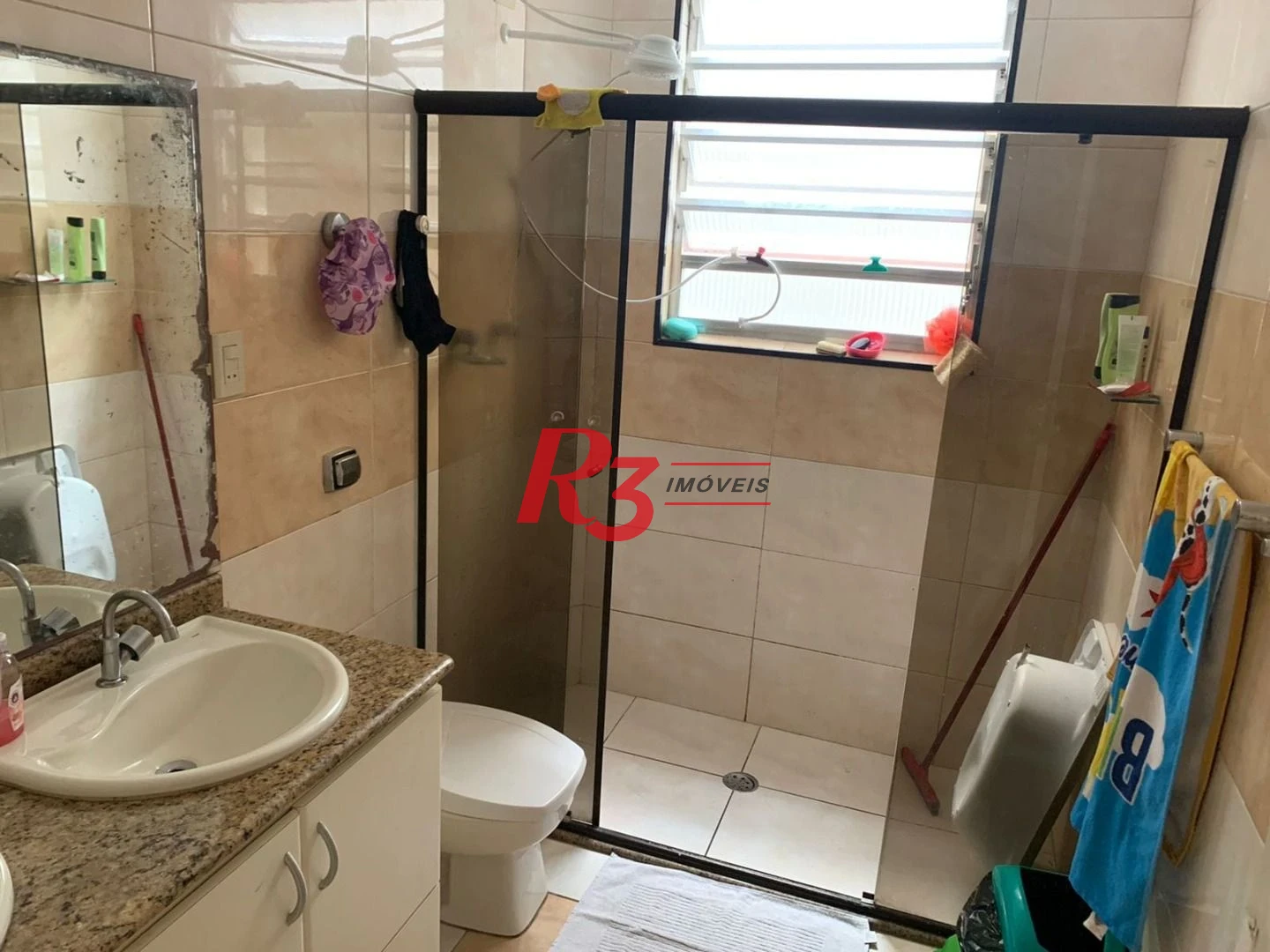 Apartamento com 3 dormitórios à venda, 100 m² por R$ 450.000,00 - Gonzaga - Santos/SP