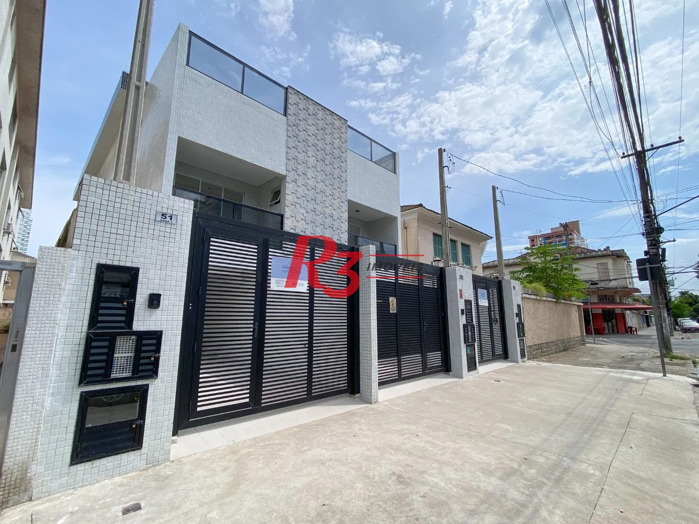 Casa com 3 dormitórios à venda, 150 m² por R$ 1.545.000,00 - Embaré - Santos/SP
