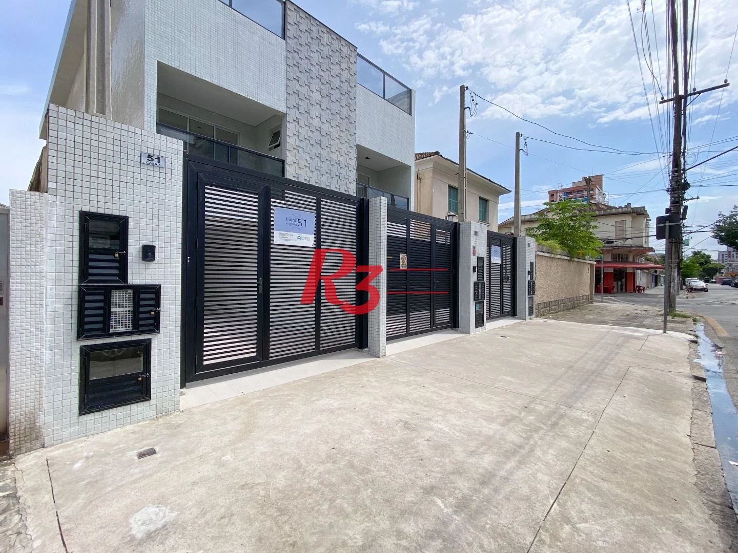 Casa com 3 dormitórios à venda, 150 m² por R$ 1.545.000,00 - Embaré - Santos/SP