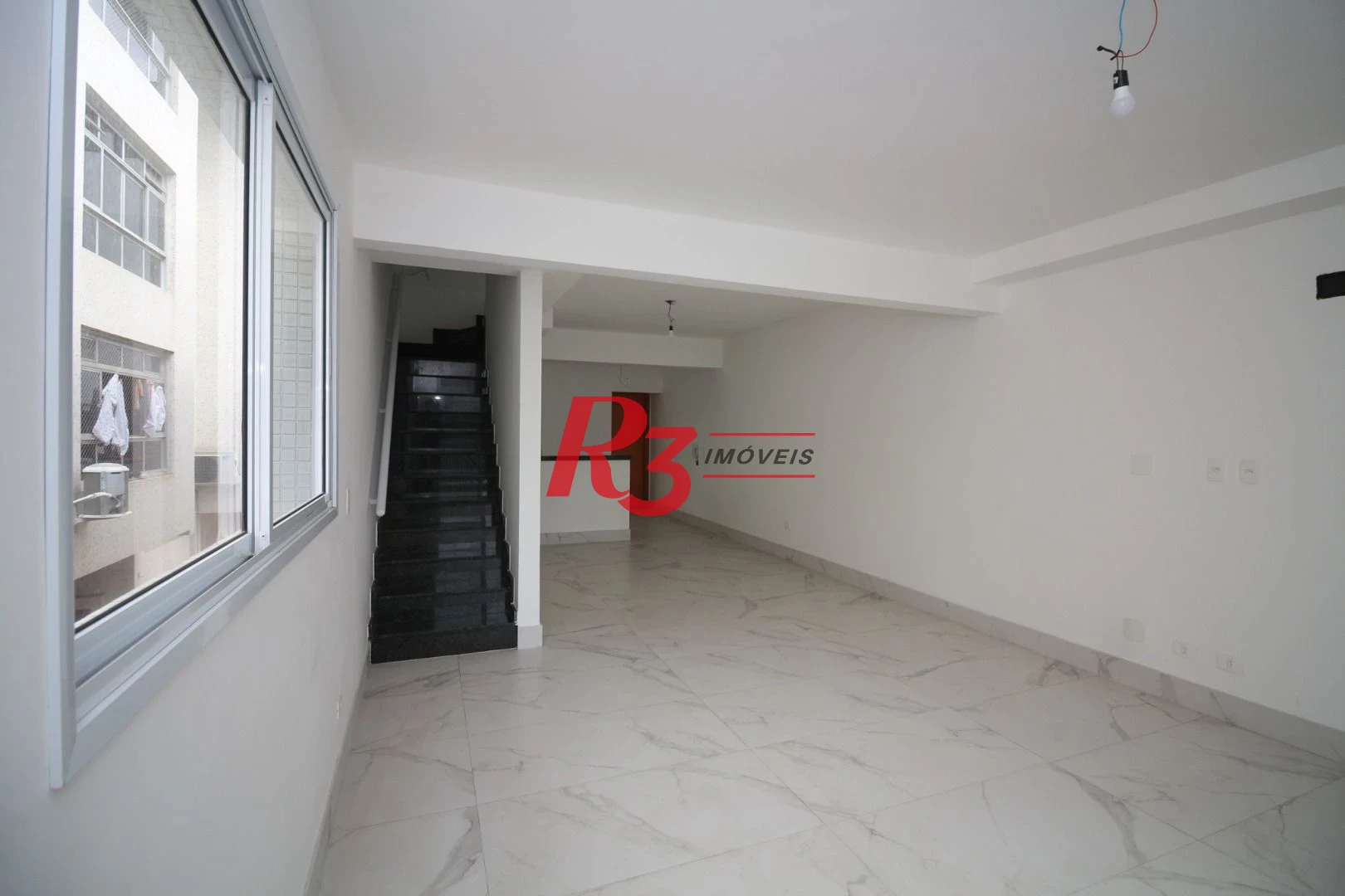 Casa com 3 dormitórios à venda, 150 m² por R$ 1.545.000,00 - Embaré - Santos/SP