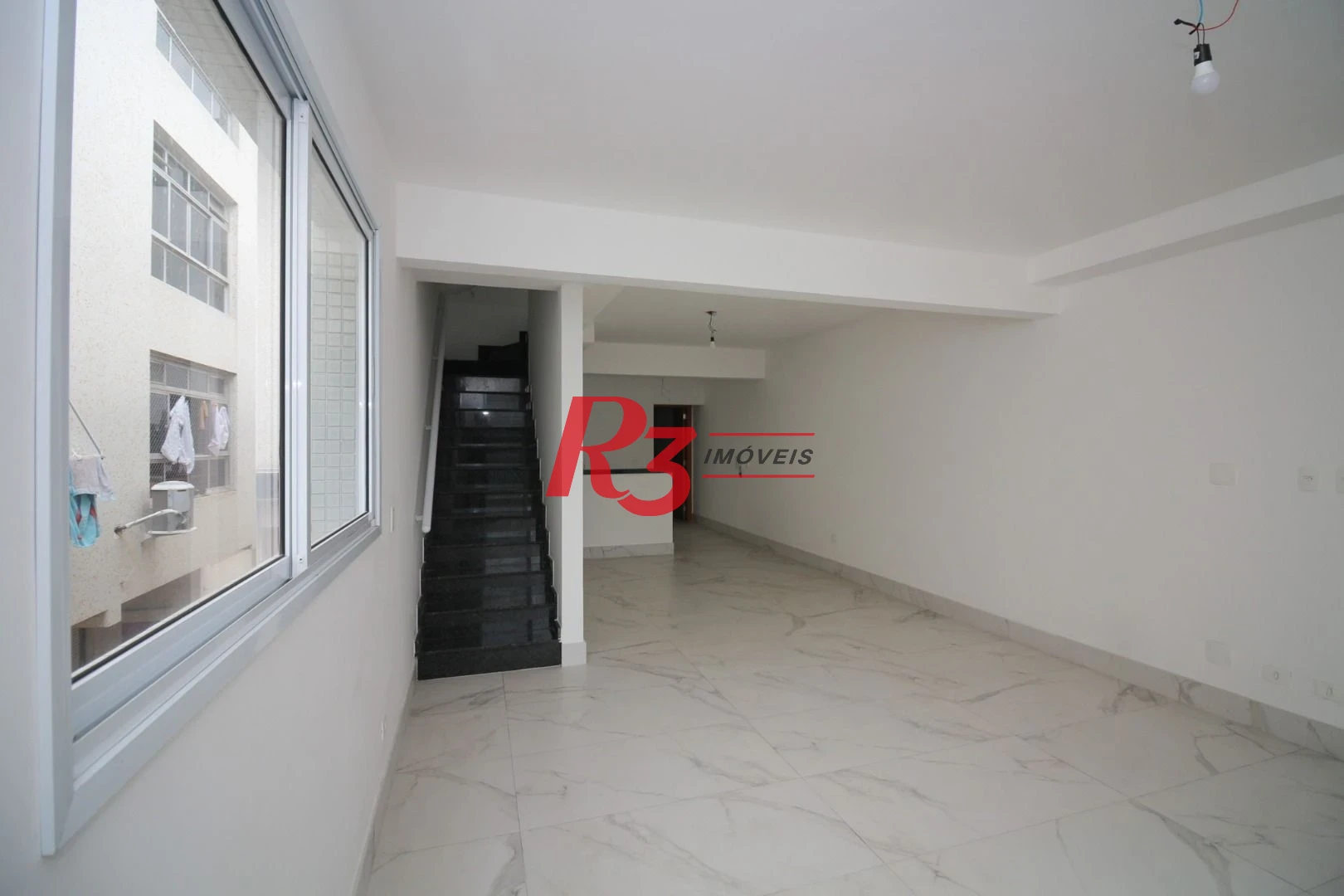 Casa com 3 dormitórios à venda, 150 m² por R$ 1.545.000,00 - Embaré - Santos/SP