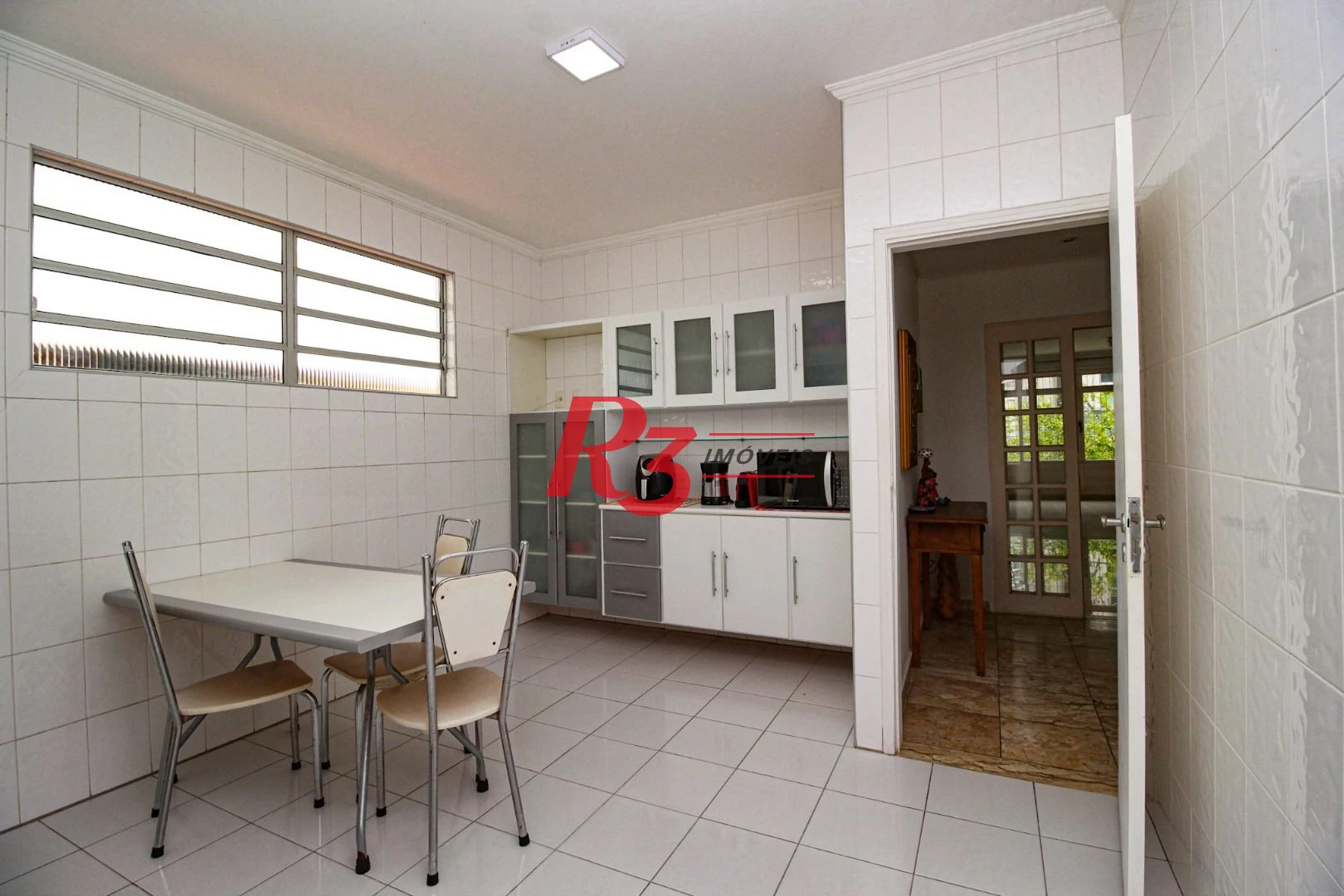 Casa, 228 m² - venda por R$ 1.224.000,00 ou aluguel por R$ 7.650,00/mês - Ponta da Praia - Santos/SP
