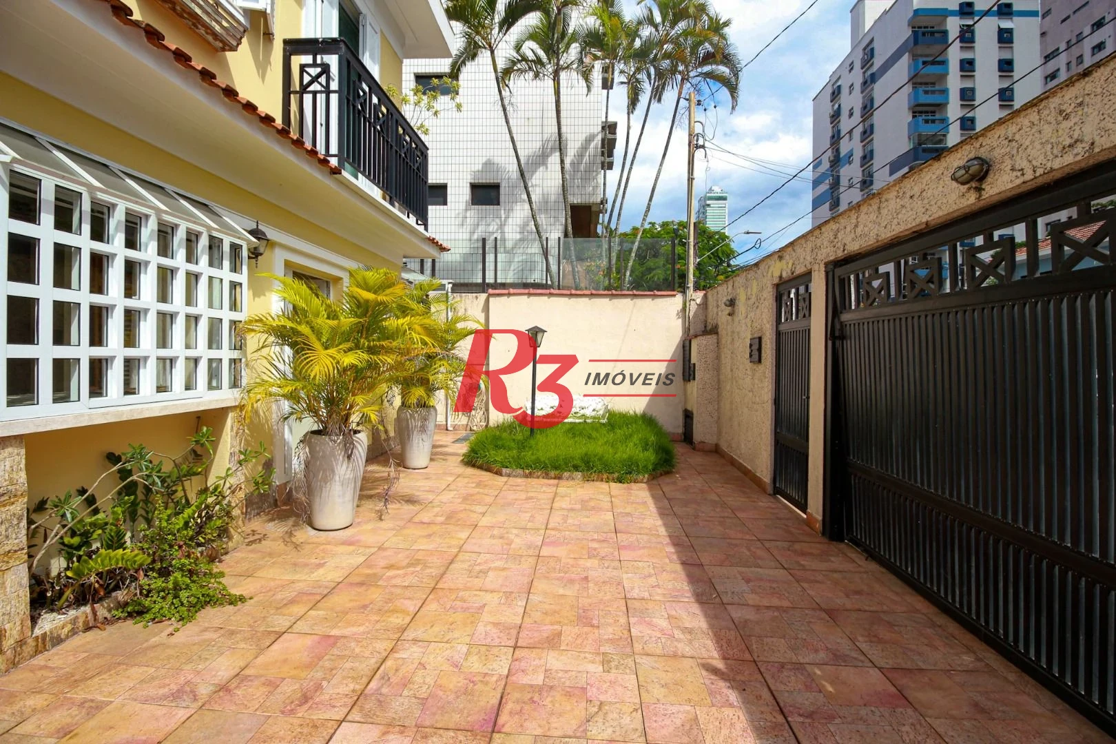 Sobrado à venda, 200 m² por R$ 2.080.000,00 - Embaré - Santos/SP
