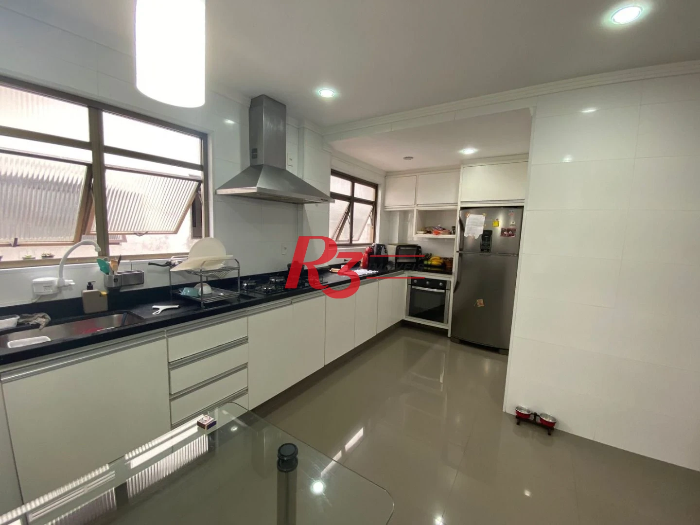Sobrado com 4 dormitórios à venda, 212 m² por R$ 1.420.000,00 - Embaré - Santos/SP