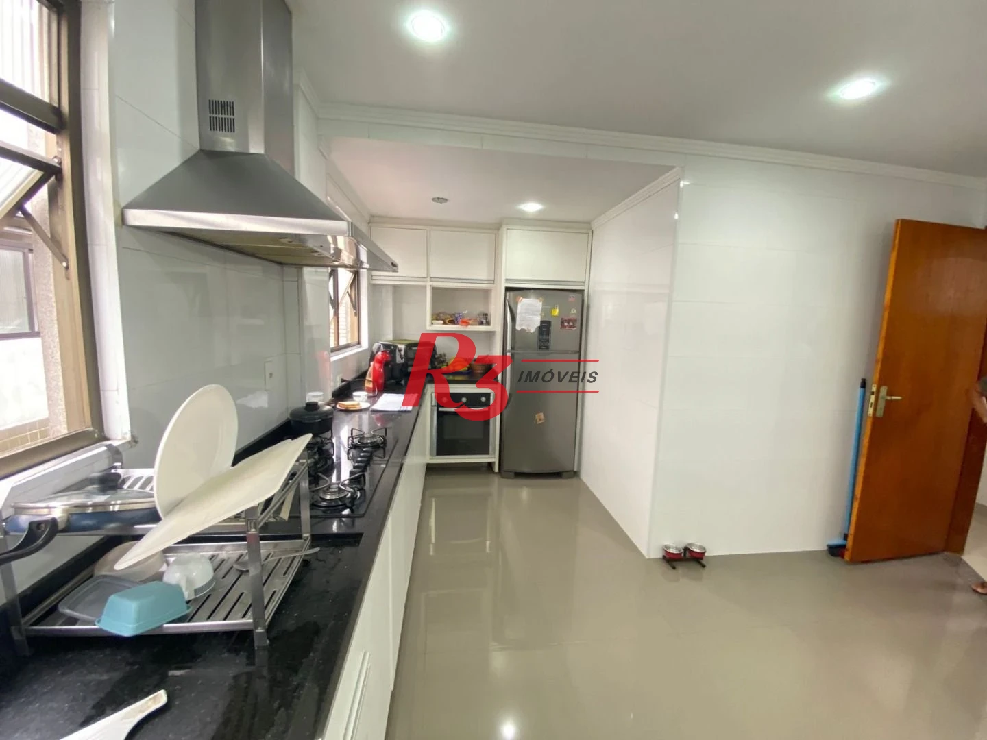 Sobrado com 4 dormitórios à venda, 212 m² por R$ 1.420.000,00 - Embaré - Santos/SP