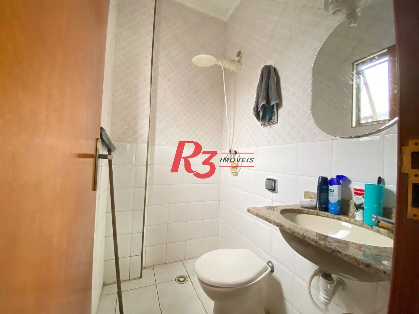 Sobrado com 4 dormitórios à venda, 212 m² por R$ 1.420.000,00 - Embaré - Santos/SP