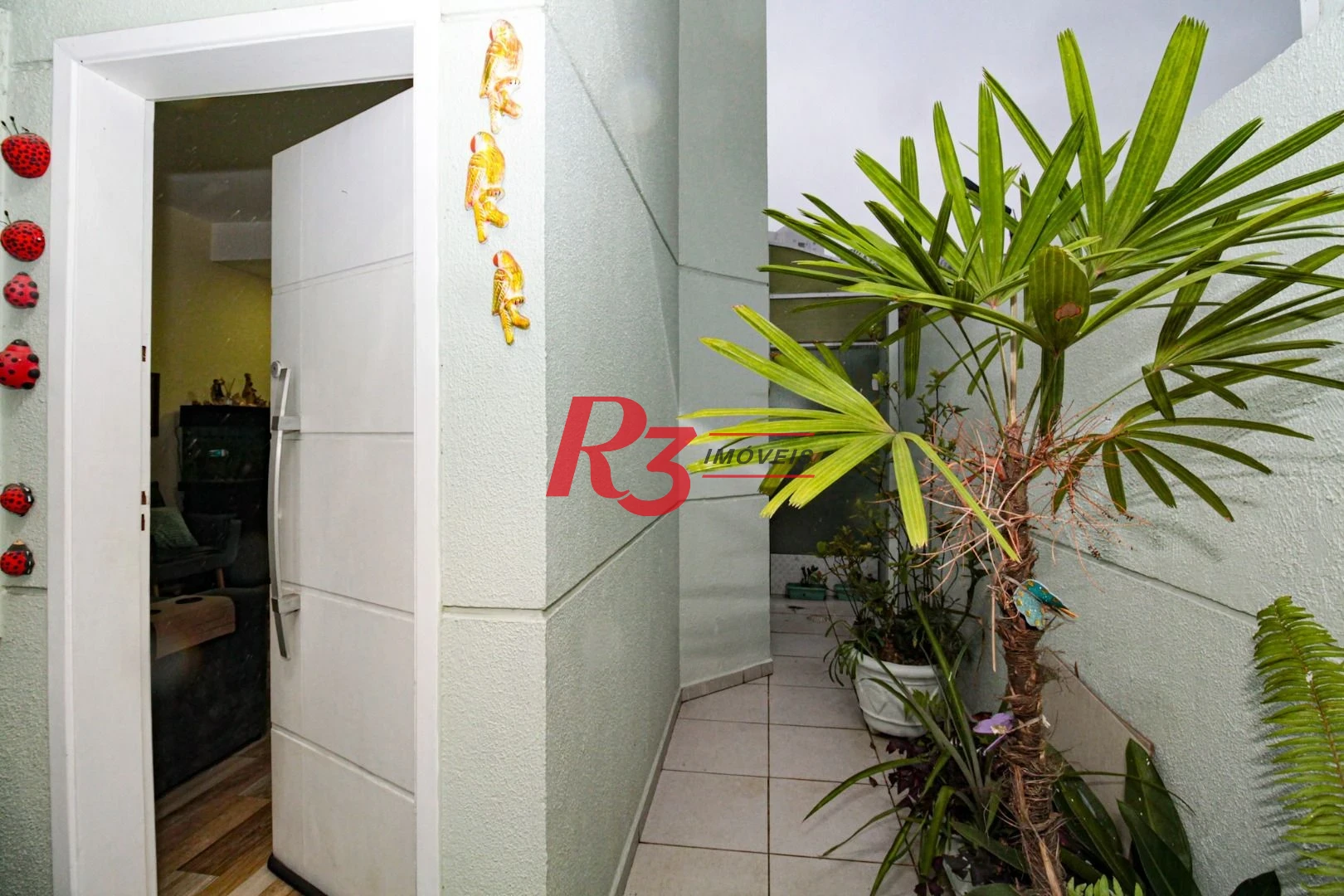 Sobrado com 3 dormitórios à venda, 89 m² por R$ 750.000,00 - Campo Grande - Santos/SP