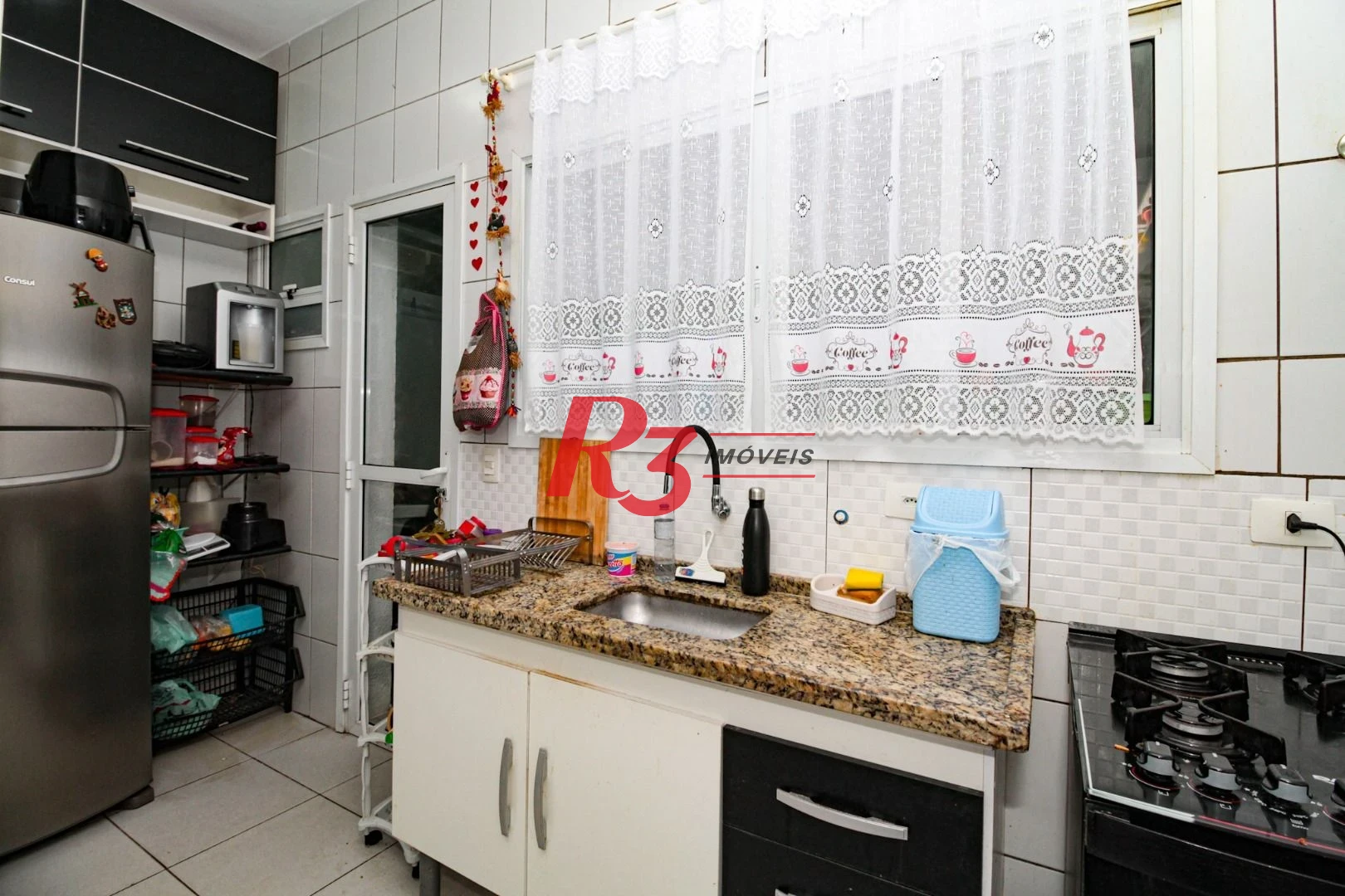 Sobrado com 3 dormitórios à venda, 89 m² por R$ 750.000,00 - Campo Grande - Santos/SP