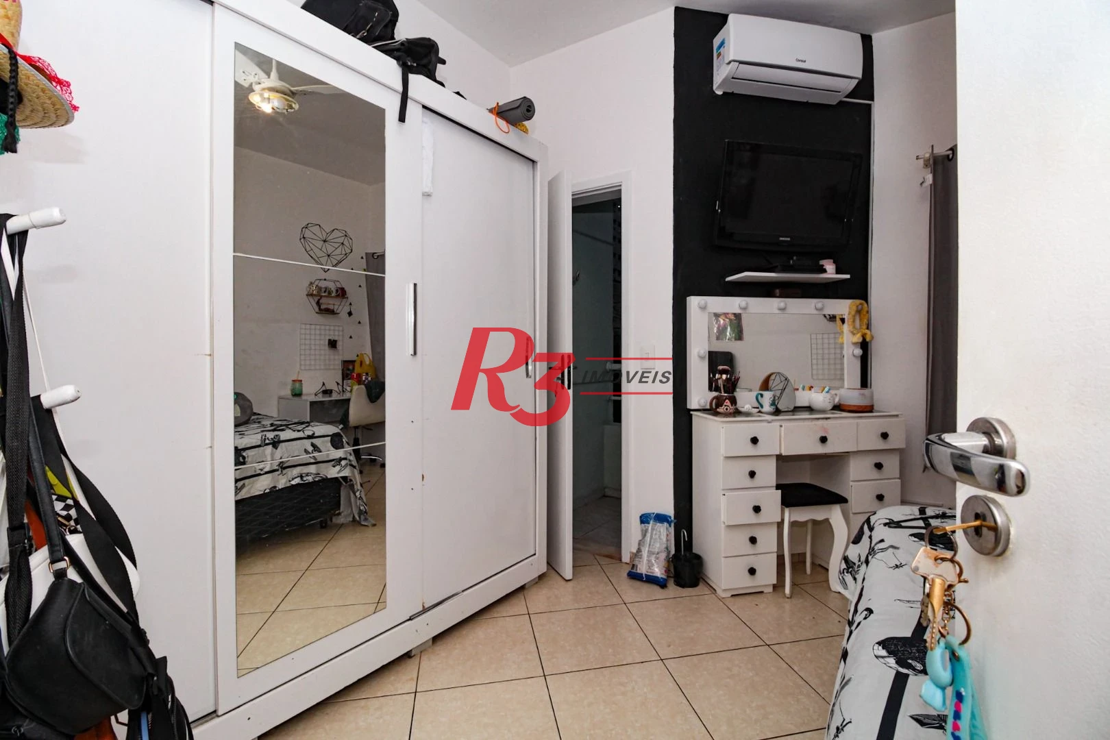 Sobrado com 3 dormitórios à venda, 89 m² por R$ 750.000,00 - Campo Grande - Santos/SP