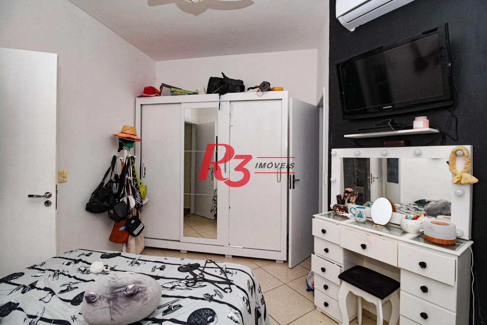 Sobrado com 3 dormitórios à venda, 89 m² por R$ 750.000,00 - Campo Grande - Santos/SP