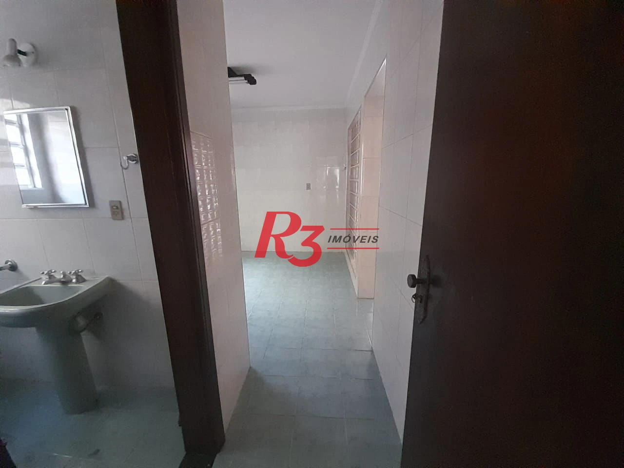 Casa com 3 dormitórios à venda, 250 m² por R$ 1.600.000,00 - Gonzaga - Santos/SP