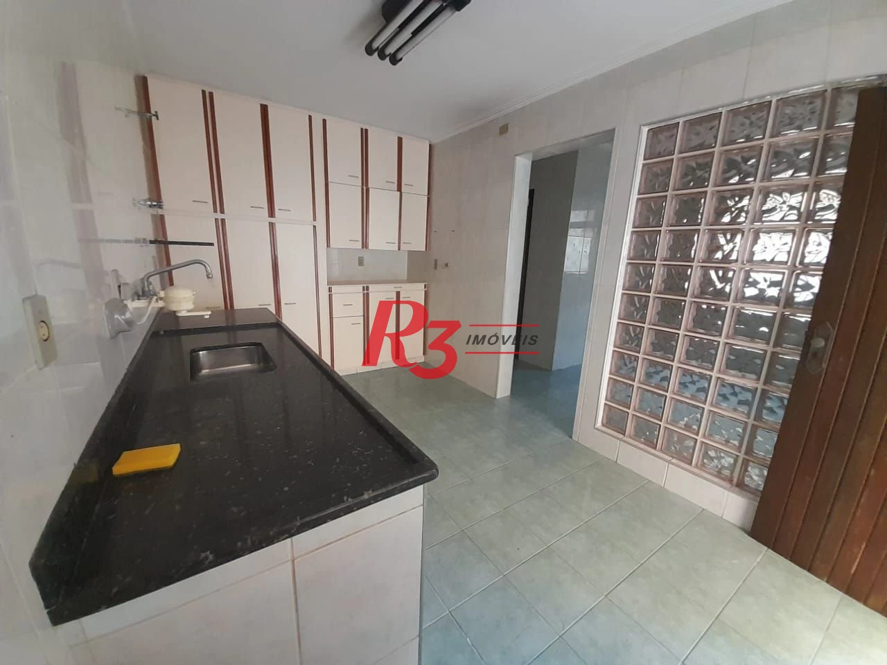 Casa com 3 dormitórios à venda, 250 m² por R$ 1.600.000,00 - Gonzaga - Santos/SP