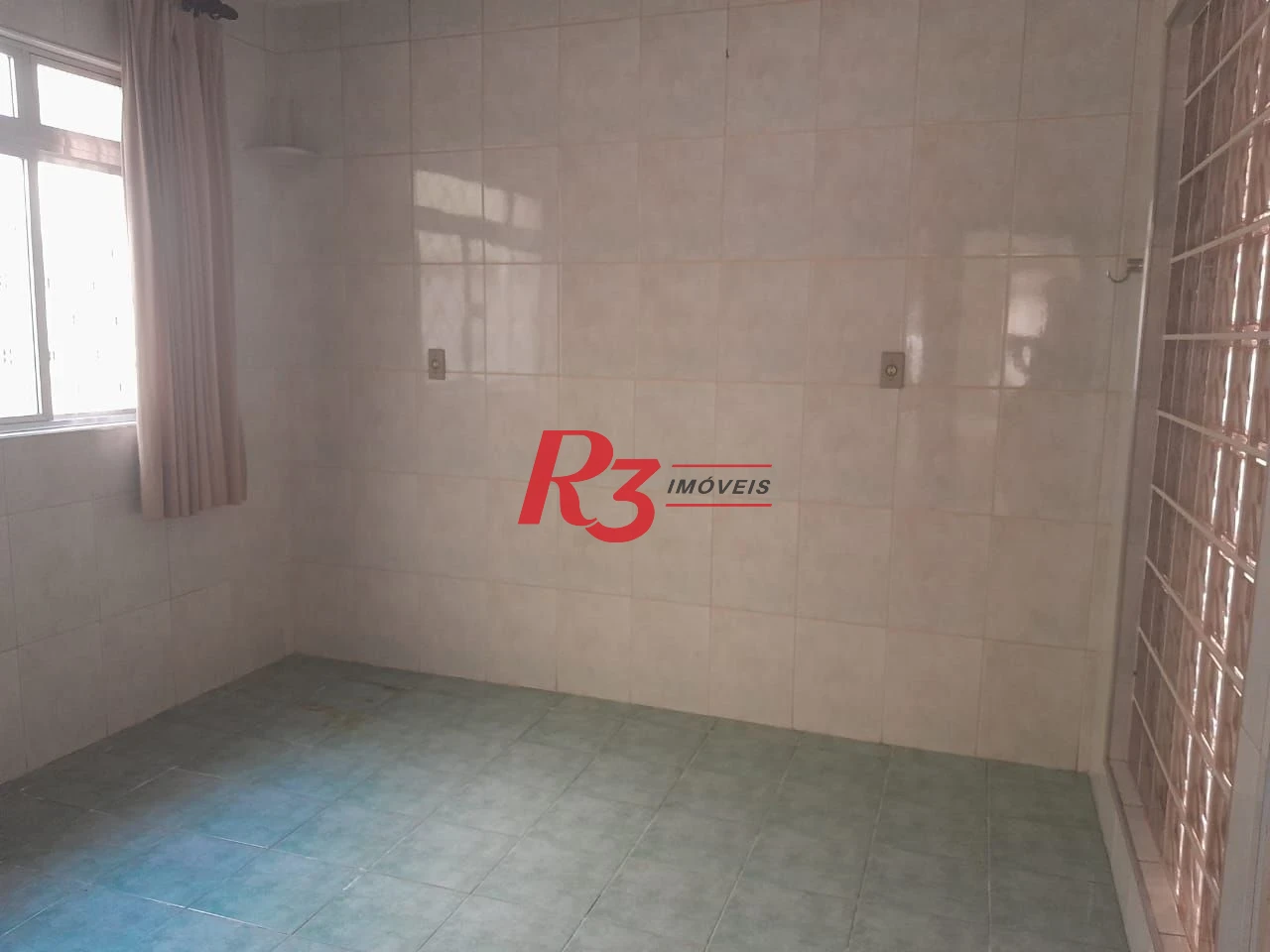Casa com 3 dormitórios à venda, 250 m² por R$ 1.600.000,00 - Gonzaga - Santos/SP