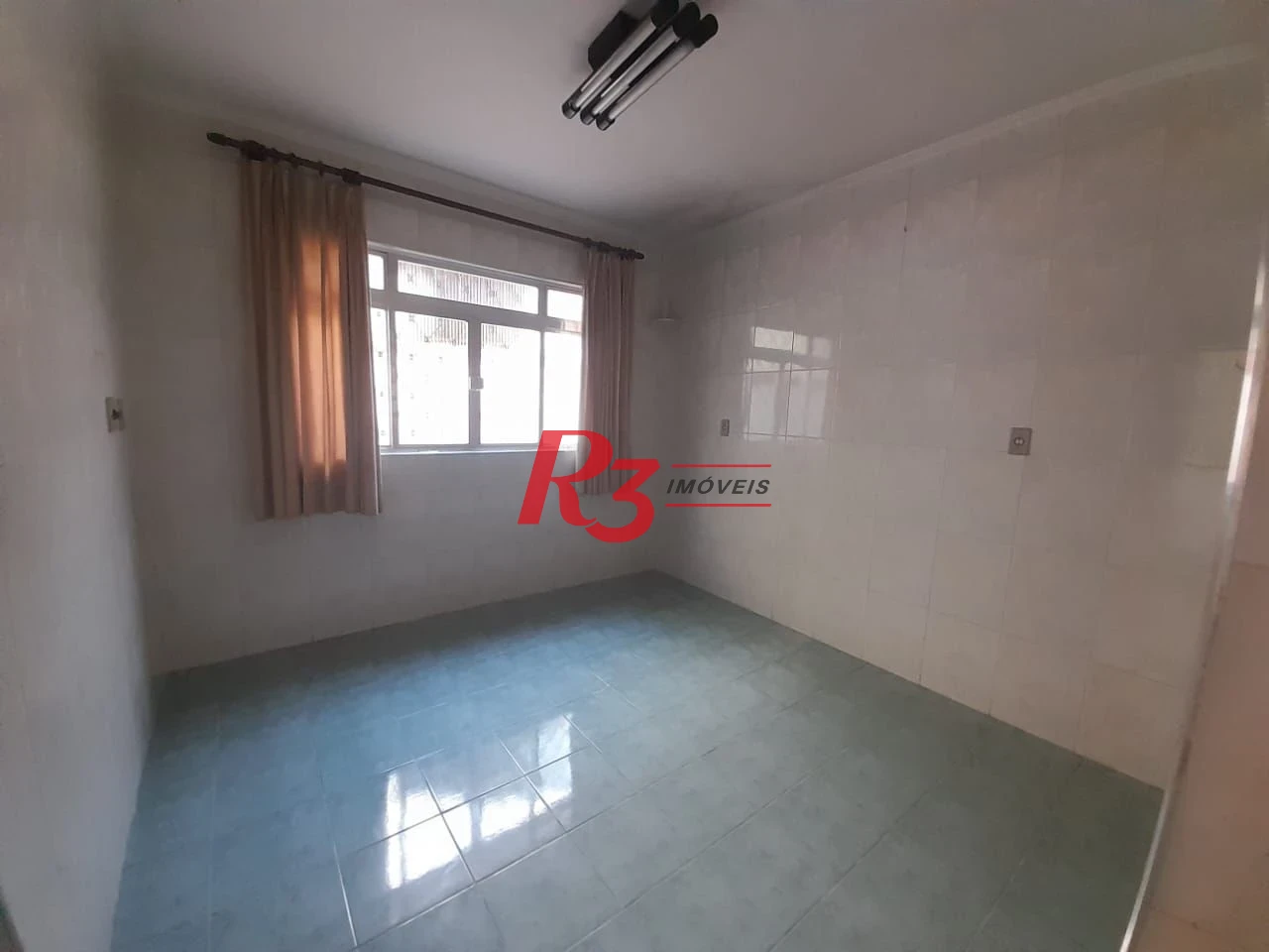 Casa com 3 dormitórios à venda, 250 m² por R$ 1.600.000,00 - Gonzaga - Santos/SP