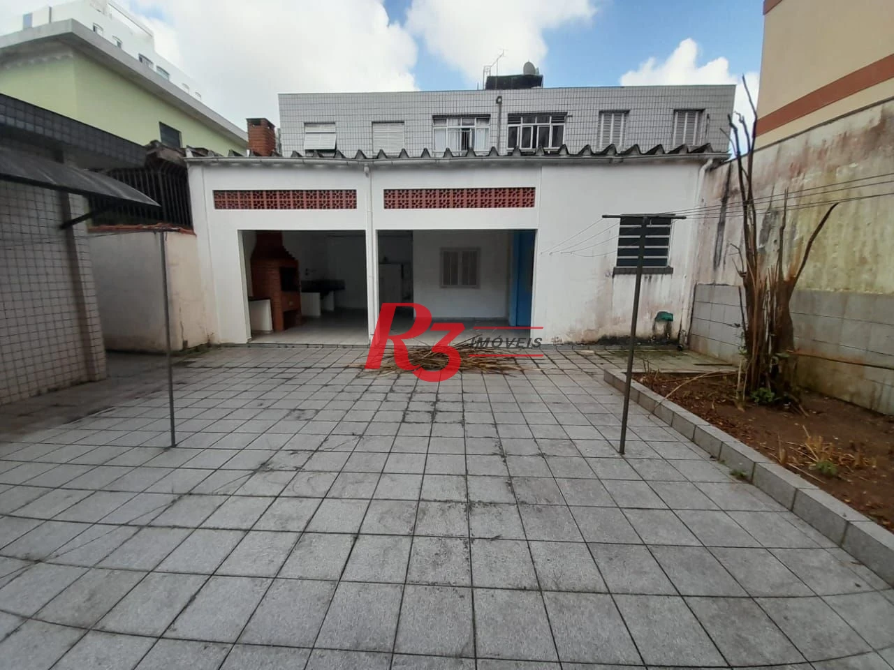 Casa com 3 dormitórios à venda, 250 m² por R$ 1.600.000,00 - Gonzaga - Santos/SP