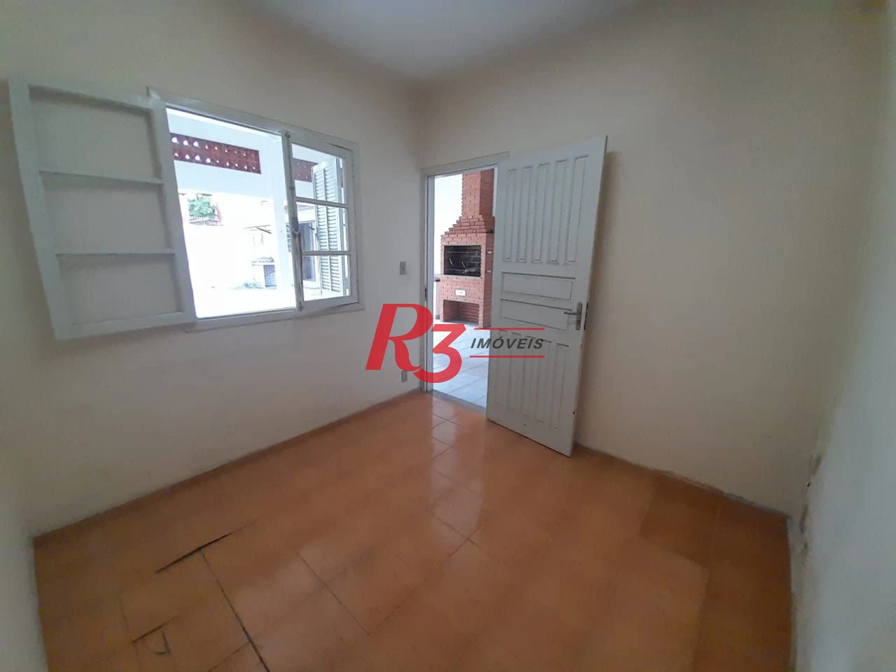 Casa com 3 dormitórios à venda, 250 m² por R$ 1.600.000,00 - Gonzaga - Santos/SP