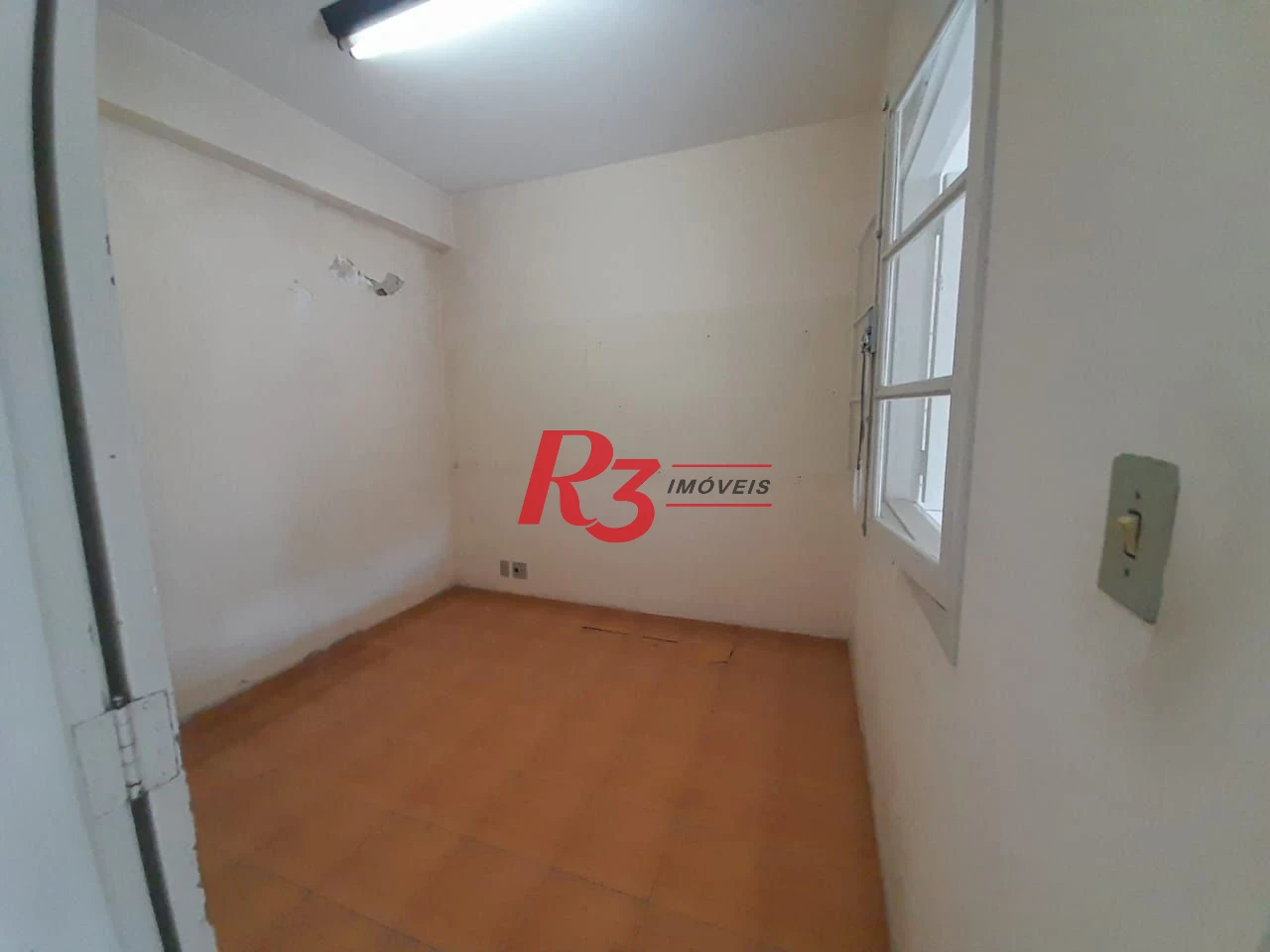 Casa com 3 dormitórios à venda, 250 m² por R$ 1.600.000,00 - Gonzaga - Santos/SP
