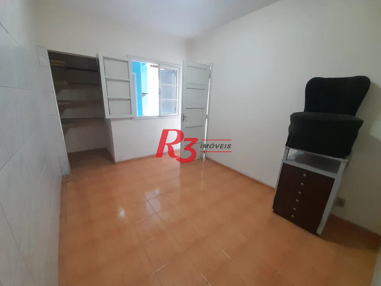 Casa com 3 dormitórios à venda, 250 m² por R$ 1.600.000,00 - Gonzaga - Santos/SP