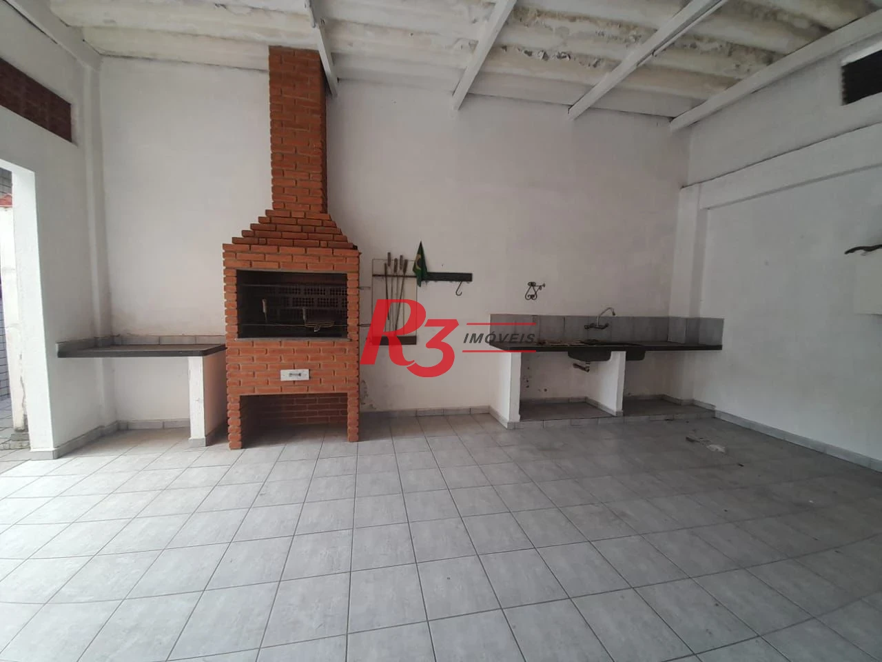 Casa com 3 dormitórios à venda, 250 m² por R$ 1.600.000,00 - Gonzaga - Santos/SP