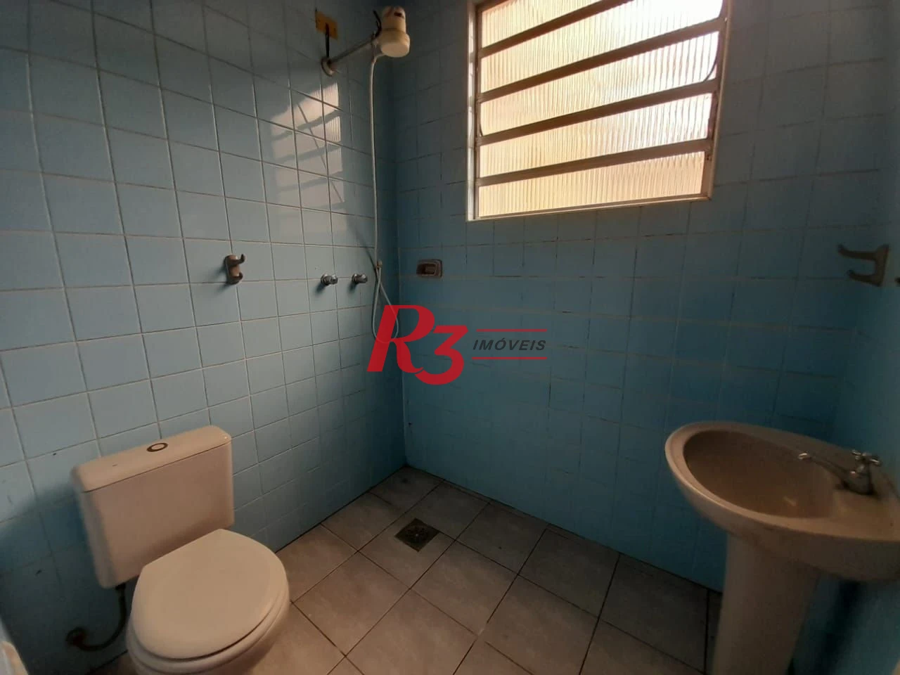 Casa com 3 dormitórios à venda, 250 m² por R$ 1.600.000,00 - Gonzaga - Santos/SP