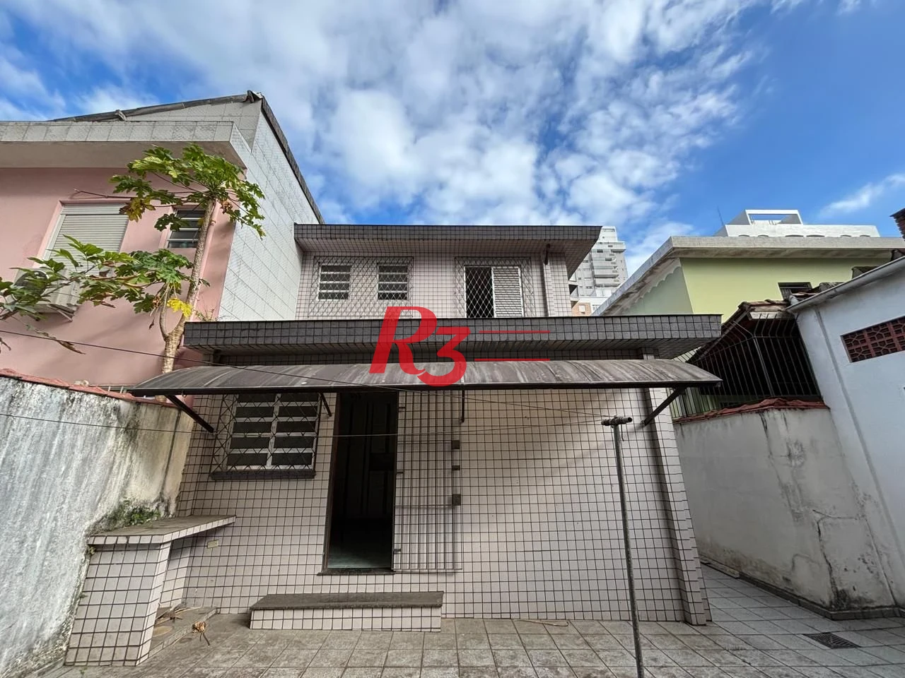 Casa com 3 dormitórios à venda, 250 m² por R$ 1.600.000,00 - Gonzaga - Santos/SP