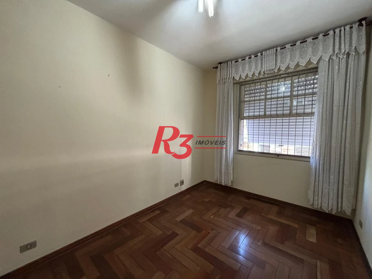 Casa com 3 dormitórios à venda, 250 m² por R$ 1.600.000,00 - Gonzaga - Santos/SP