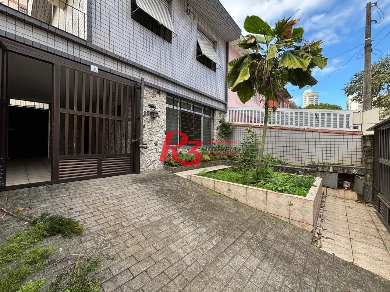 Casa com 3 dormitórios à venda, 250 m² por R$ 1.600.000,00 - Gonzaga - Santos/SP