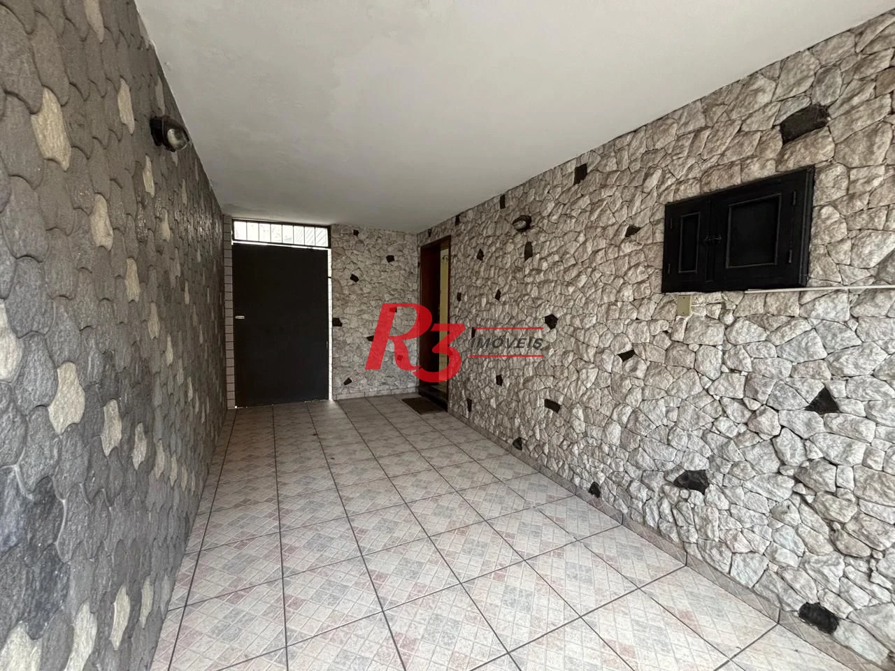 Casa com 3 dormitórios à venda, 250 m² por R$ 1.600.000,00 - Gonzaga - Santos/SP