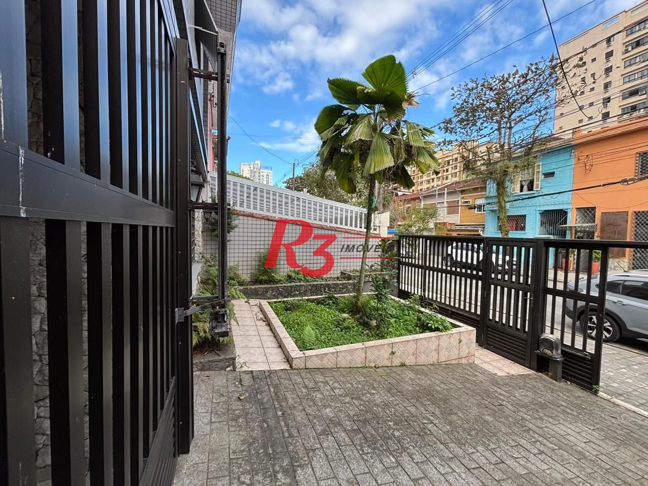 Casa com 3 dormitórios à venda, 250 m² por R$ 1.600.000,00 - Gonzaga - Santos/SP