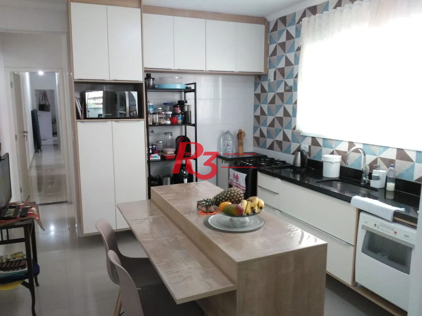 Casa com 3 dormitórios à venda, 128 m² por R$ 790.000,00 - Ponta da Praia - Santos/SP