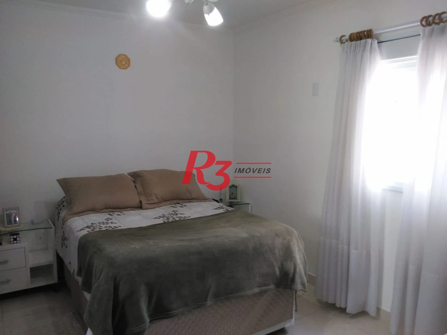 Casa com 3 dormitórios à venda, 128 m² por R$ 790.000,00 - Ponta da Praia - Santos/SP