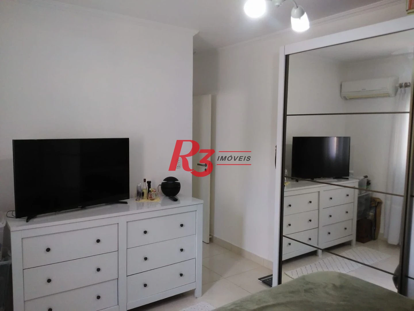 Casa com 3 dormitórios à venda, 128 m² por R$ 790.000,00 - Ponta da Praia - Santos/SP