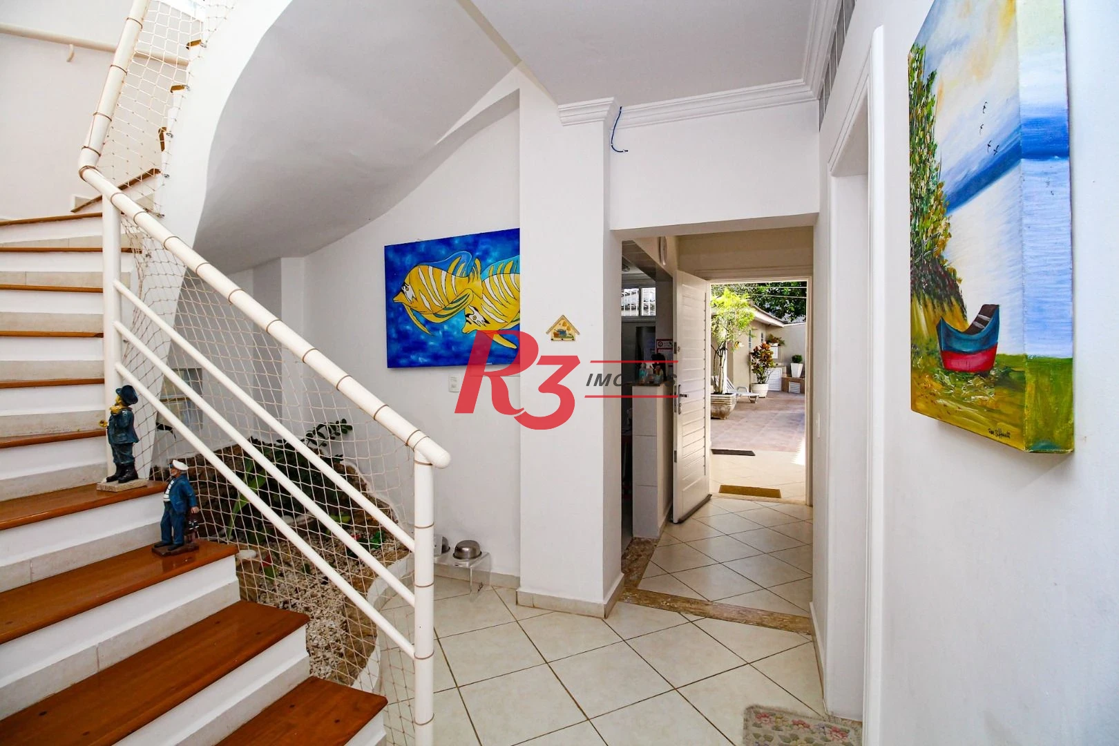 Sobrado à venda, 340 m² por R$ 2.700.000,00 - Loteamento João Batista Julião - Guarujá/SP