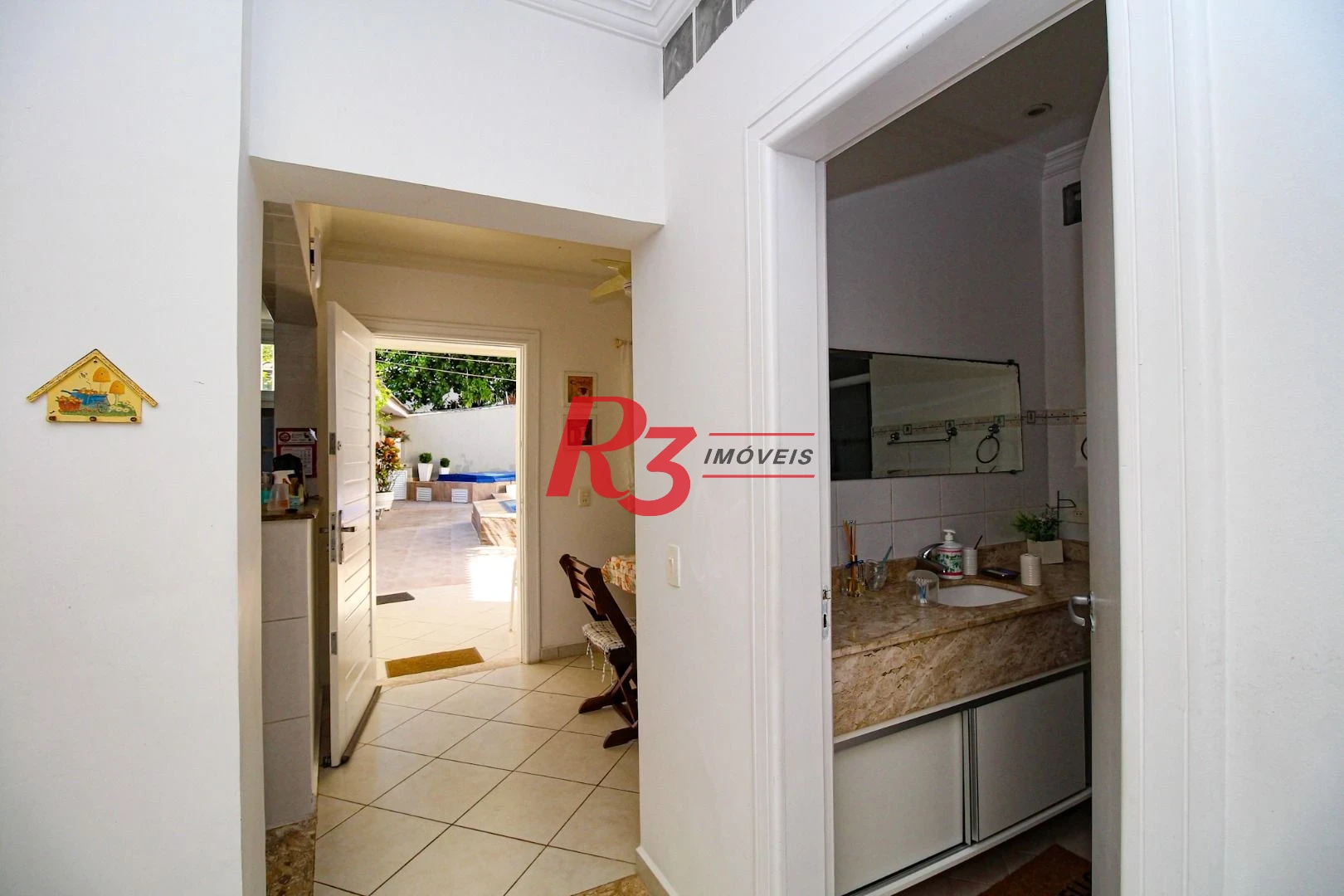 Sobrado à venda, 340 m² por R$ 2.700.000,00 - Loteamento João Batista Julião - Guarujá/SP