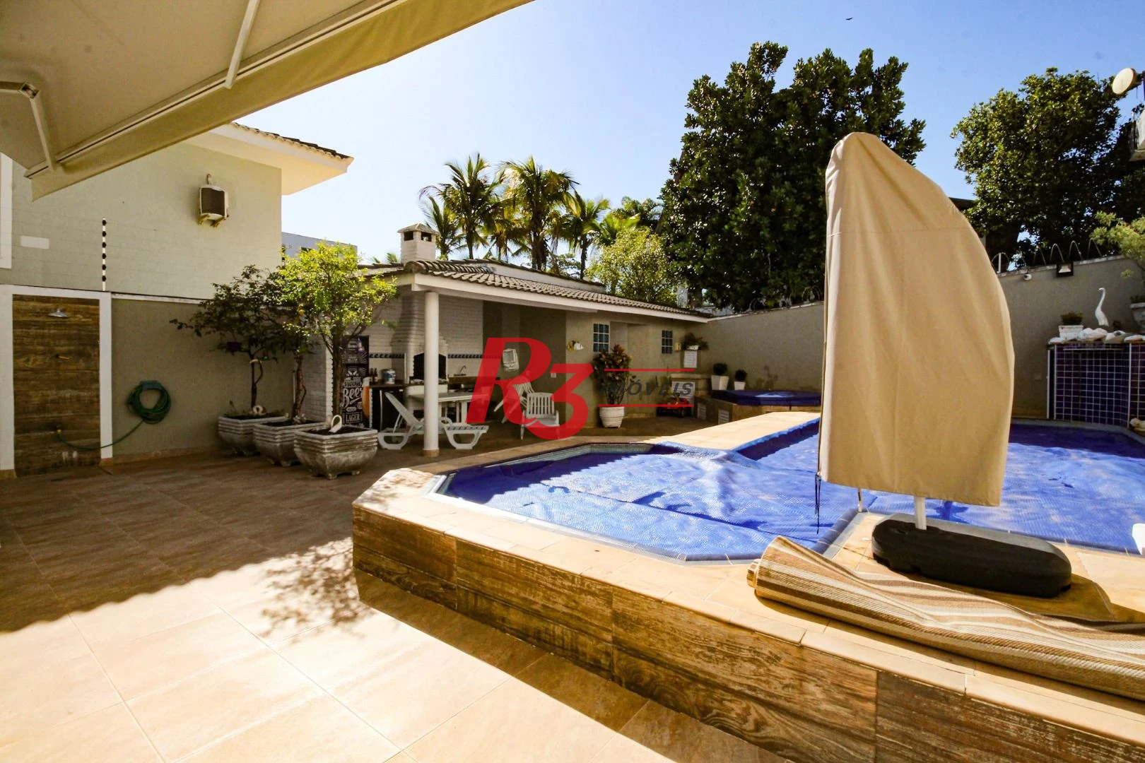 Sobrado à venda, 340 m² por R$ 2.700.000,00 - Loteamento João Batista Julião - Guarujá/SP