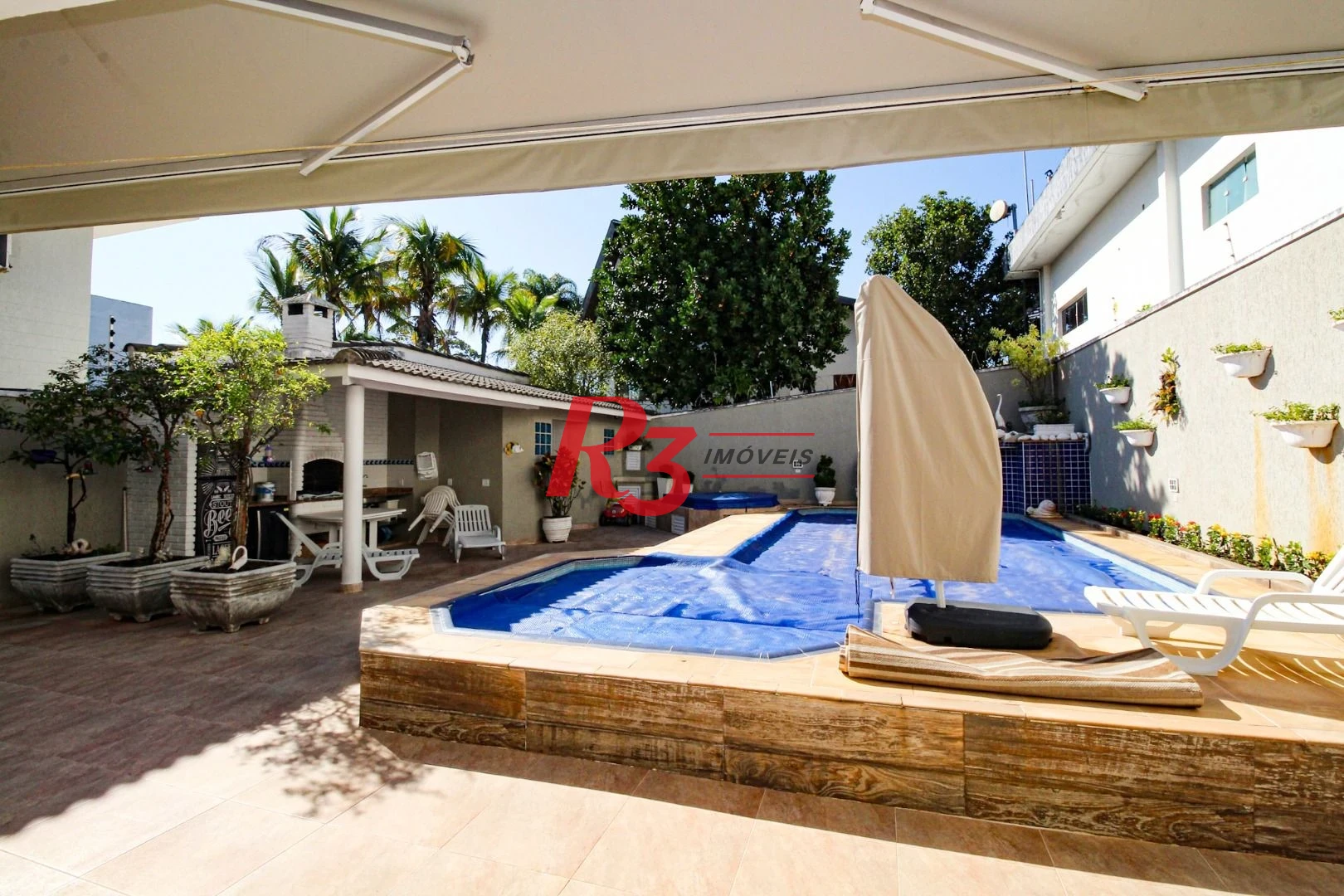 Sobrado à venda, 340 m² por R$ 2.700.000,00 - Loteamento João Batista Julião - Guarujá/SP