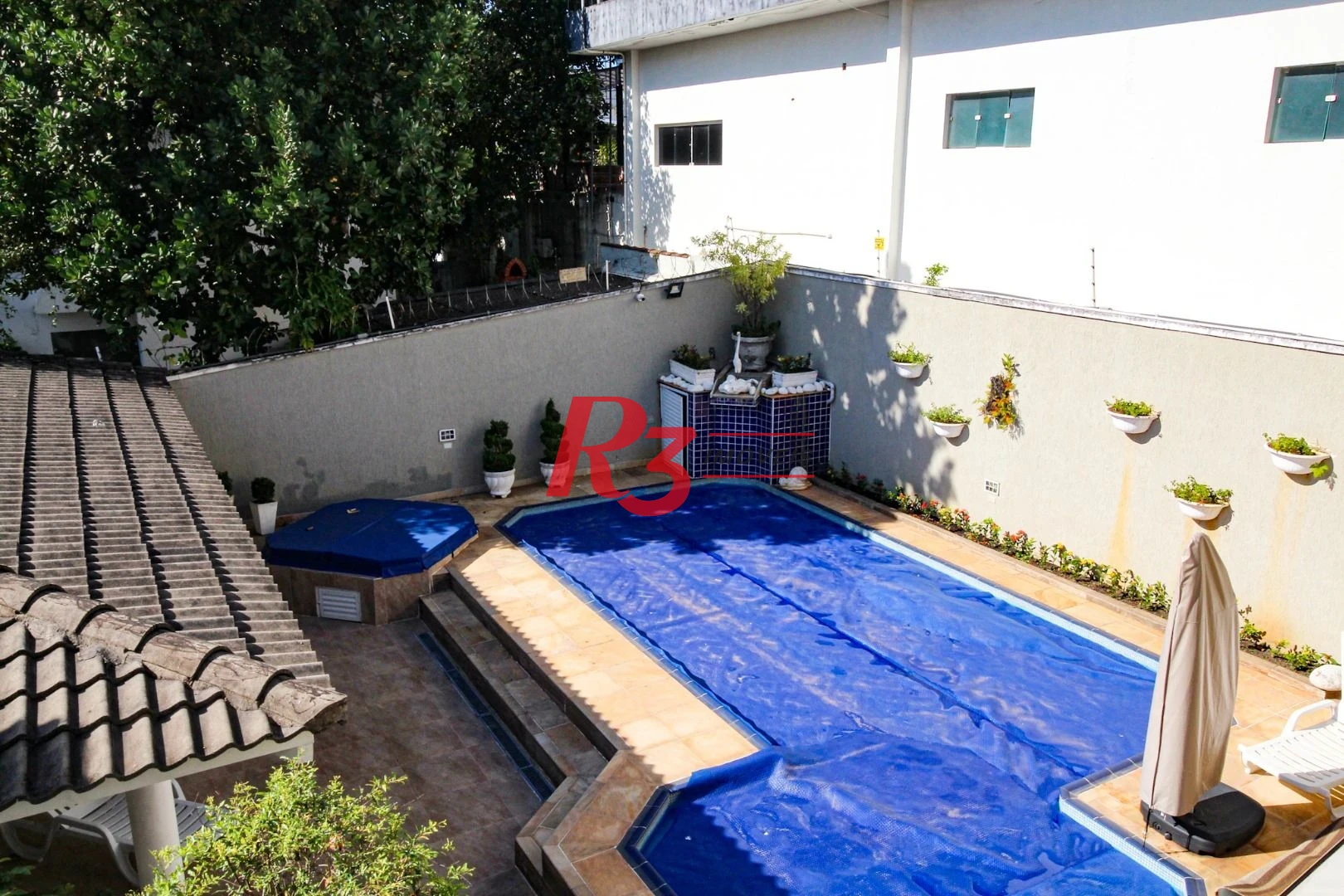 Sobrado à venda, 340 m² por R$ 2.700.000,00 - Loteamento João Batista Julião - Guarujá/SP