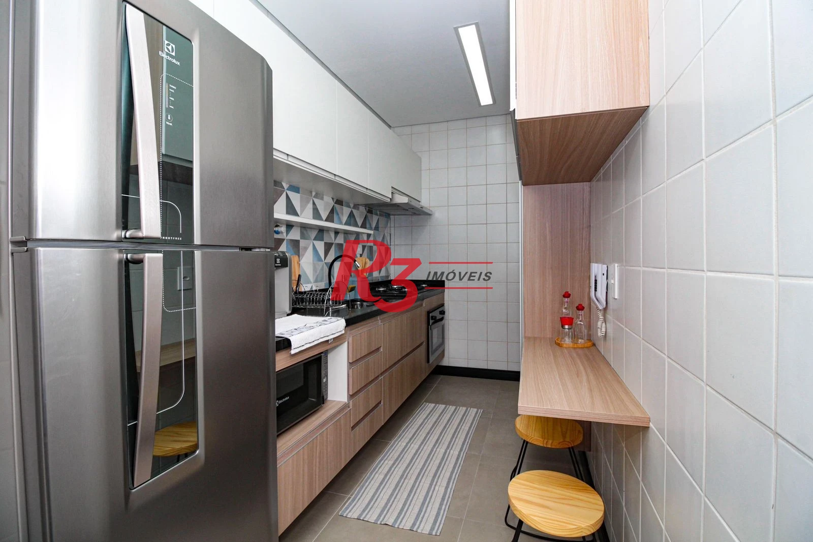 Apartamento com 1 dormitório para alugar, 60 m² por R$ 3.300,00/mês - Encruzilhada - Santos/SP