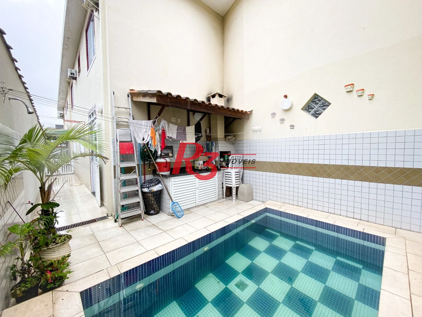 Sobrado com 3 dormitórios à venda, 130 m² por R$ 1.180.000,00 - José Menino - Santos/SP