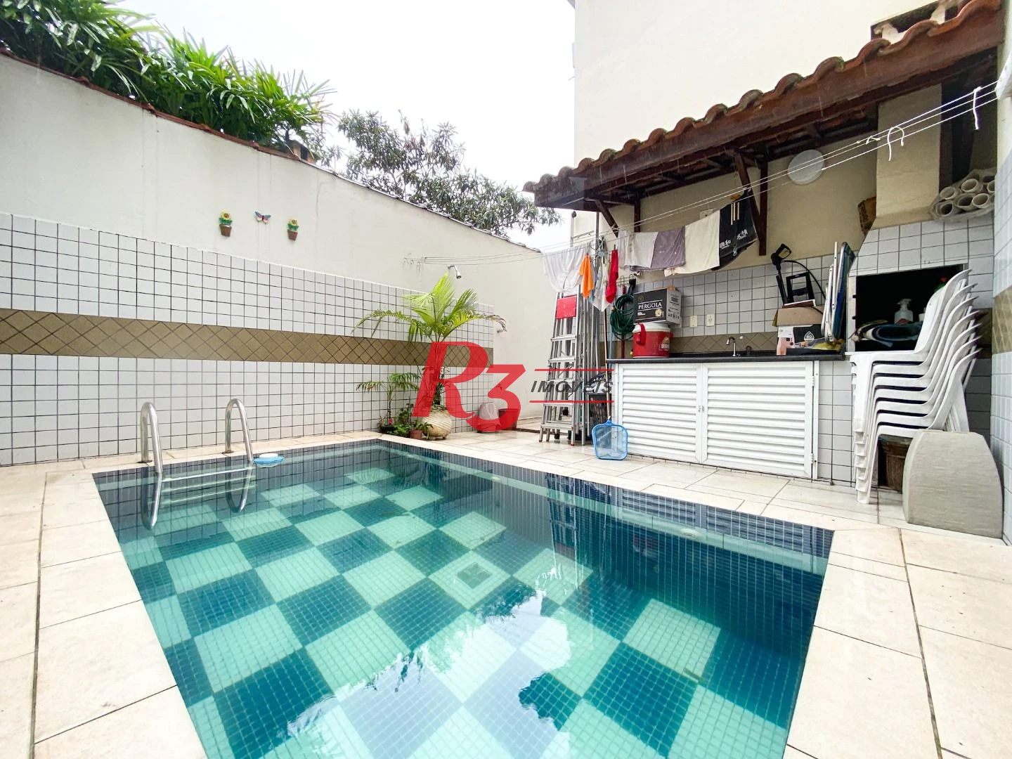 Sobrado com 3 dormitórios à venda, 130 m² por R$ 1.180.000,00 - José Menino - Santos/SP